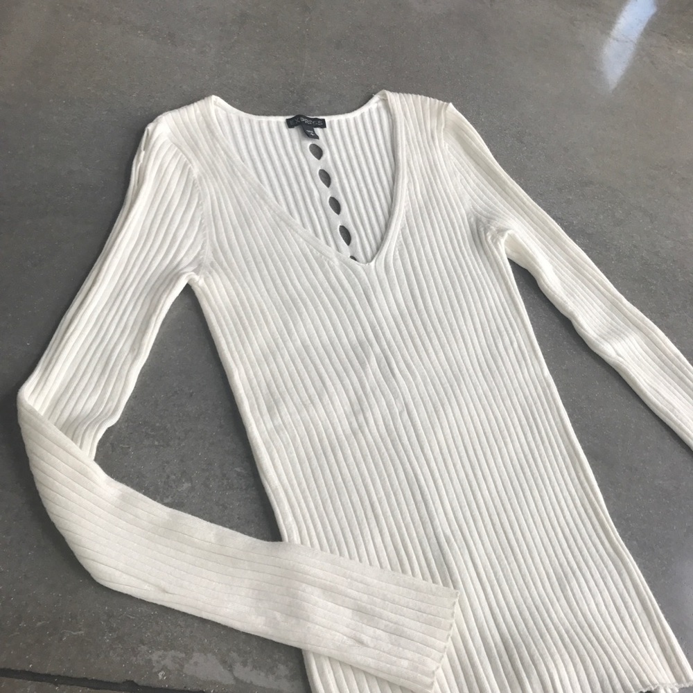 Soft Express sweater with arm and back details.